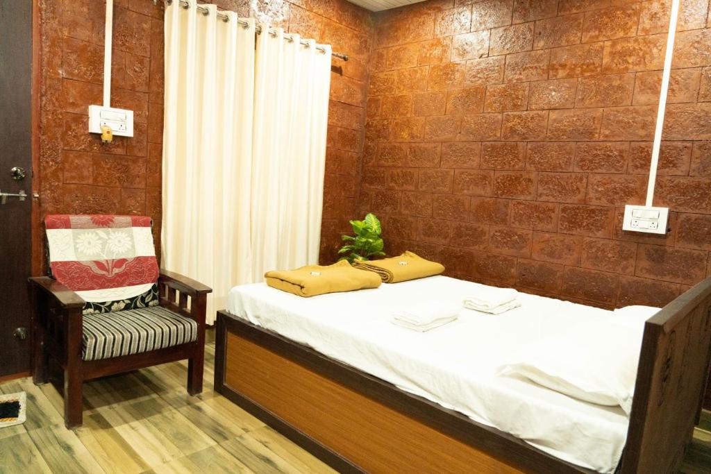 Postel nebo postele na pokoji v ubytování Good Vibes Homestay-Honnavar