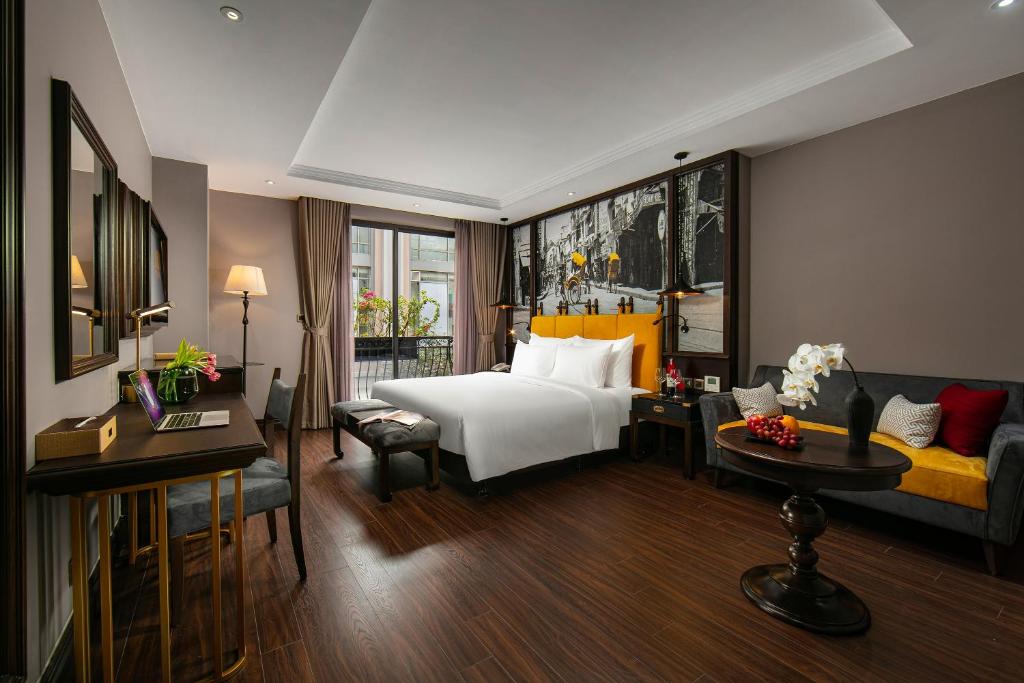 Postel nebo postele na pokoji v ubytování Hanoi Lion Boutique Hotel & Spa