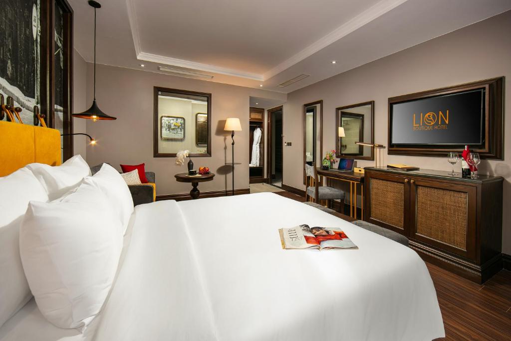 Postel nebo postele na pokoji v ubytování Hanoi Lion Boutique Hotel & Spa