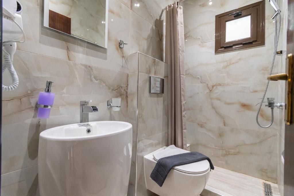 Koupelna v ubytování Hotel Petunia