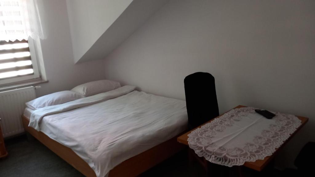 Posteľ alebo postele v izbe v ubytovaní Zielone Zacisze