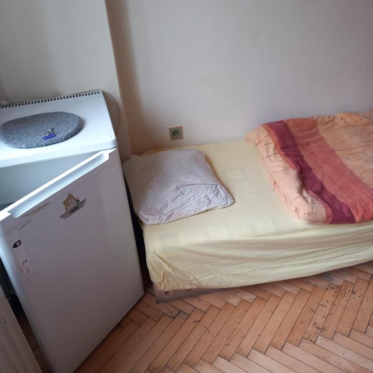 Postel nebo postele na pokoji v ubytování flat 18 minutes from Vaclavske namesti