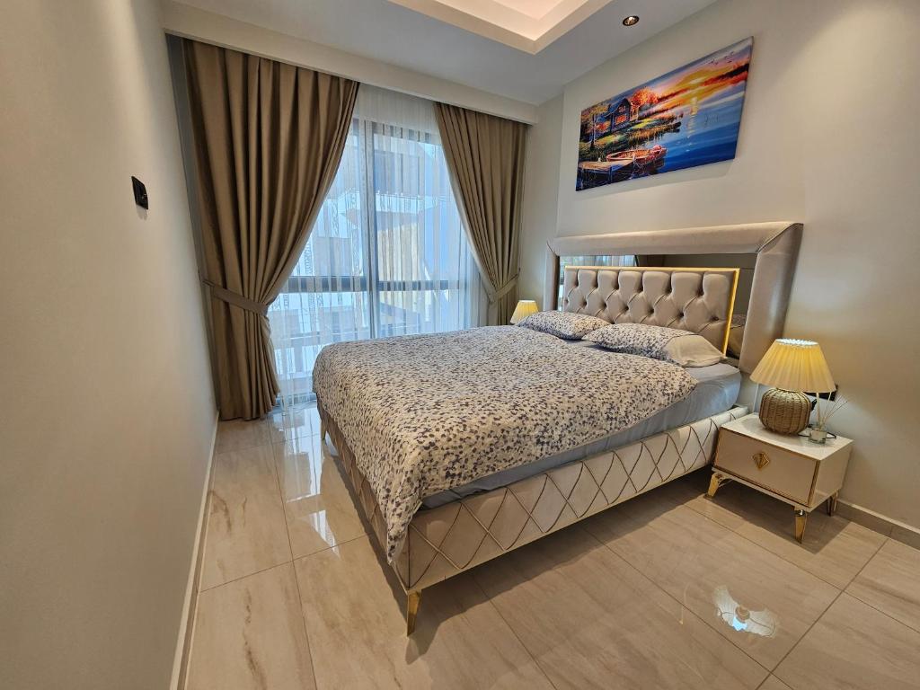 Postel nebo postele na pokoji v ubytování Cebeci Towers Luxury