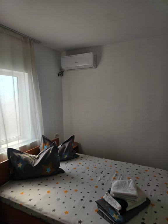 Un ou plusieurs lits dans un hébergement de l'établissement Vila Angelys