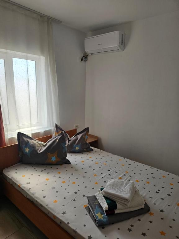 Un ou plusieurs lits dans un hébergement de l'établissement Vila Angelys