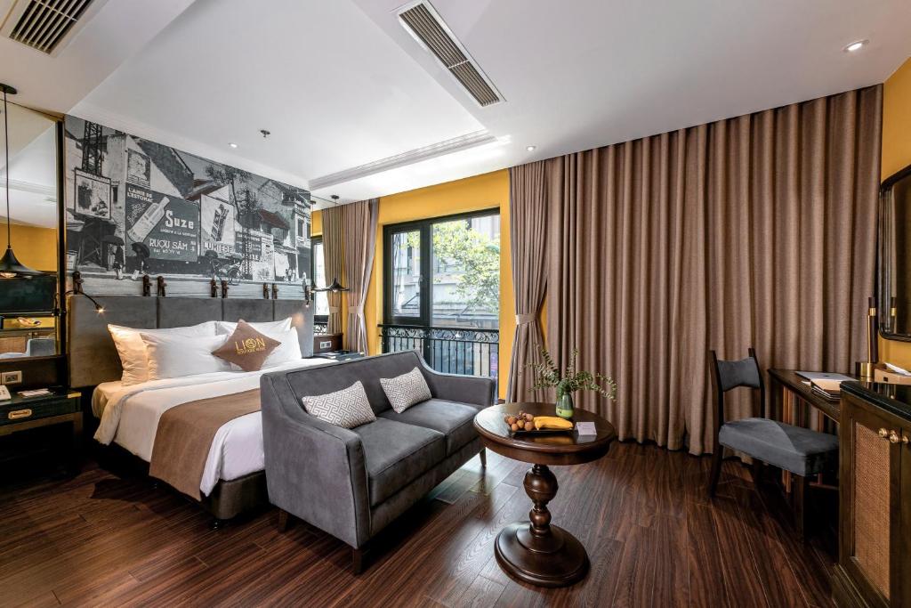 Postel nebo postele na pokoji v ubytování Hanoi Lion Boutique Hotel & Spa