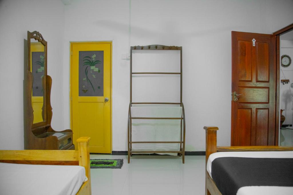 Postel nebo postele na pokoji v ubytování Onara Guest