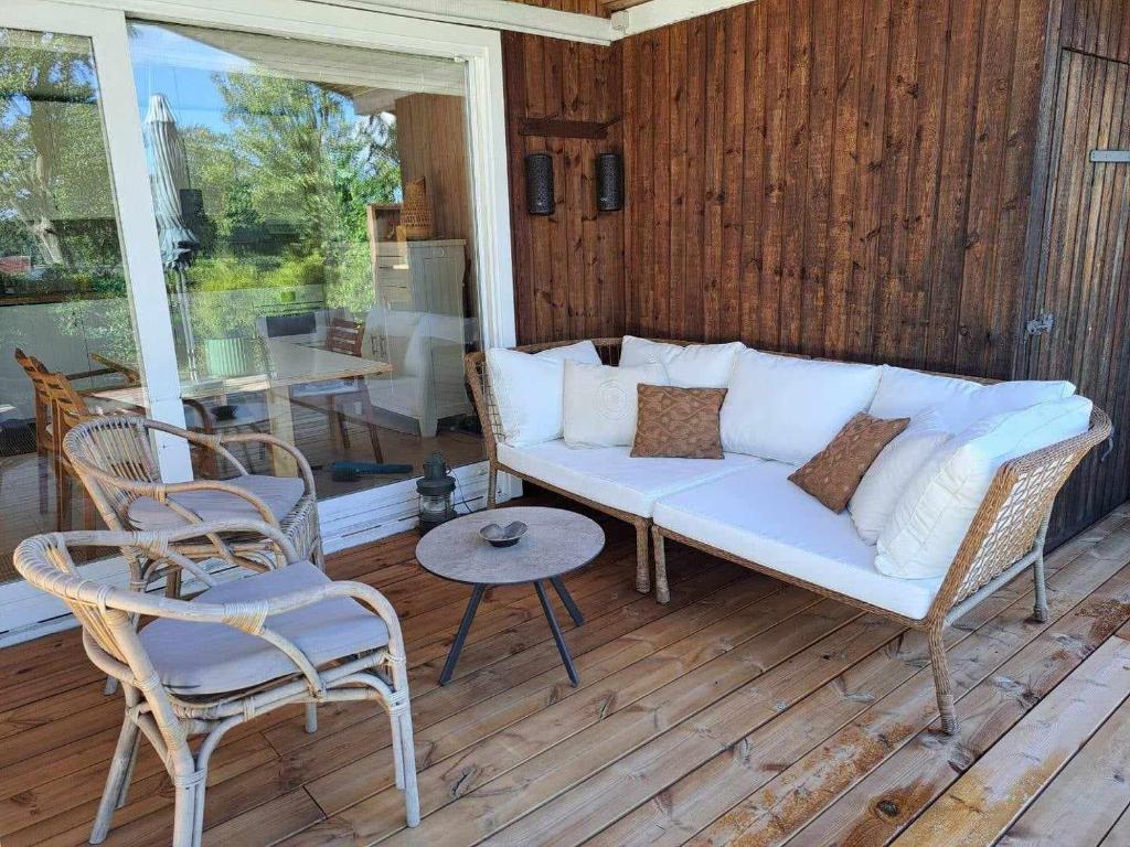 Posezení v ubytování Huset ved Følle vig