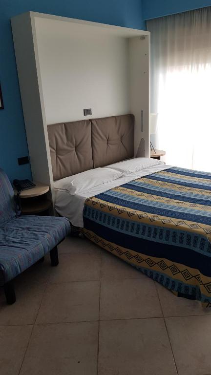 Postel nebo postele na pokoji v ubytování Addaura Village e Congressi