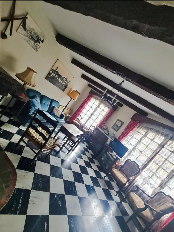 an aerial view of a living room with a checkered floor at Maison atypique in Tende