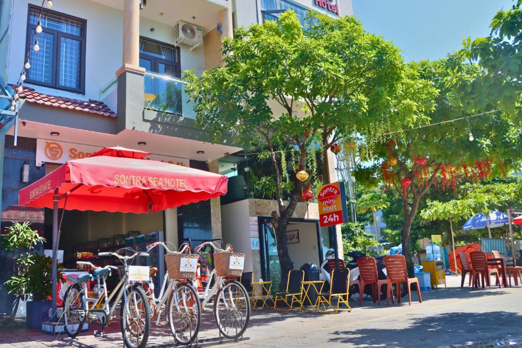 a group of bikes parked in front of a building at Sontra Sea Hotel in Danang