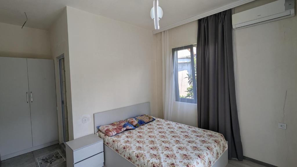 Postel nebo postele na pokoji v ubytování Hotel Palm Gonio