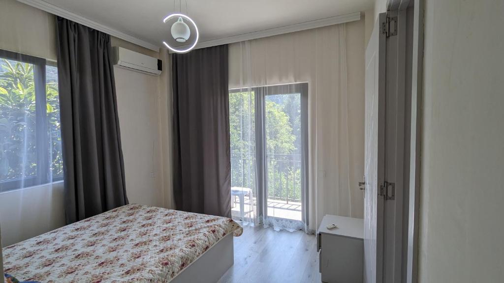 Postel nebo postele na pokoji v ubytování Hotel Palm Gonio
