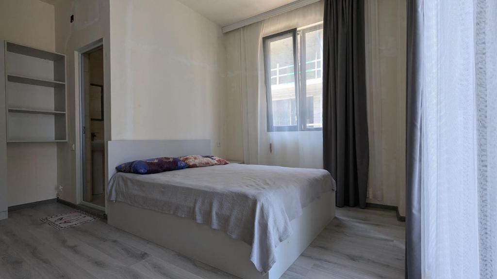 Postel nebo postele na pokoji v ubytování Hotel Palm Gonio