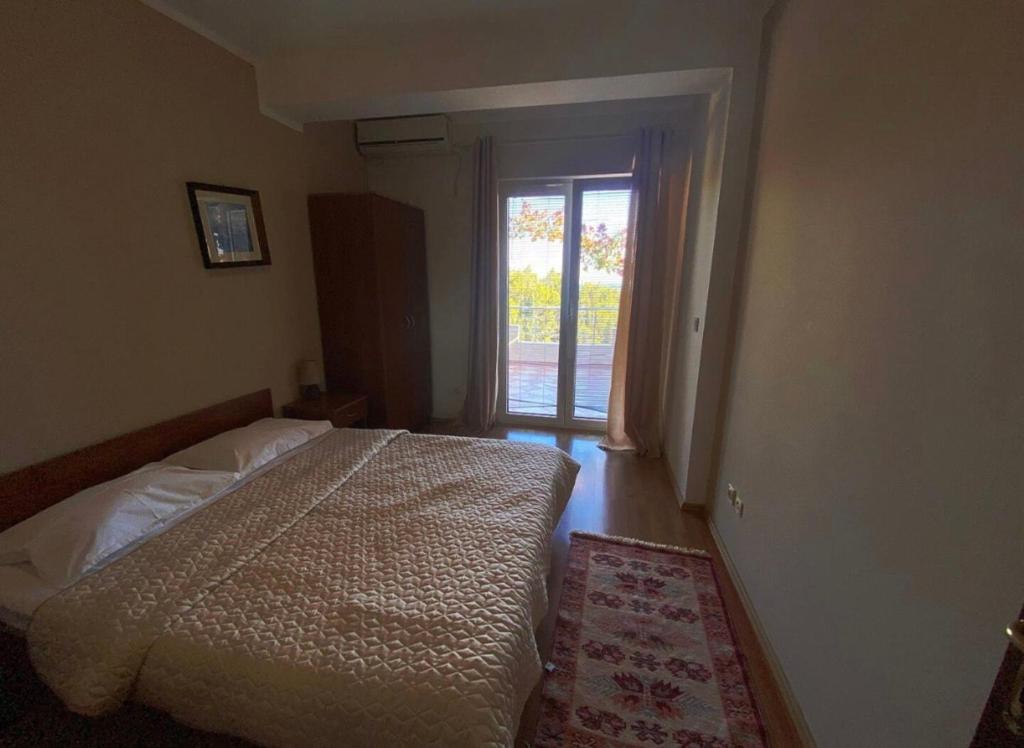 Postel nebo postele na pokoji v ubytování Casa Liburnia