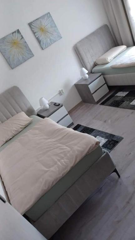 Postel nebo postele na pokoji v ubytování Apartman Šimić