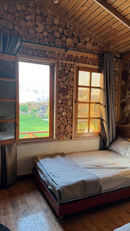 Postel nebo postele na pokoji v ubytování Gold Island Resort