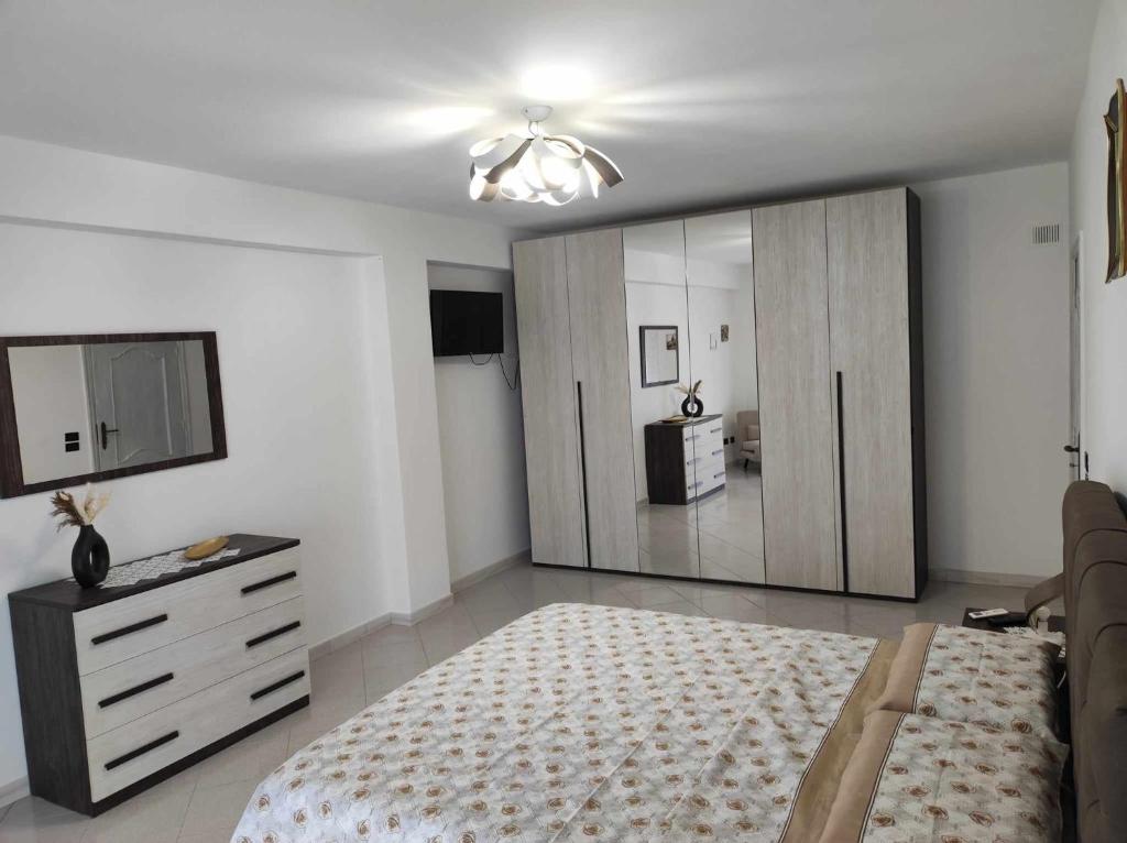 Postel nebo postele na pokoji v ubytování Casa Vacanza 6 posti letto - Grazia Home