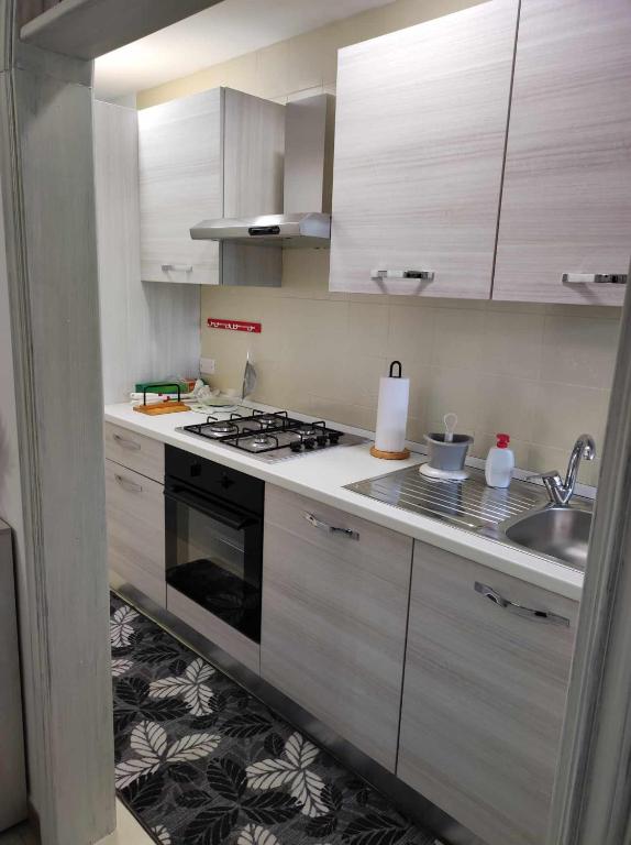 Kuchyň nebo kuchyňský kout v ubytování Casa Vacanza 6 posti letto - Grazia Home