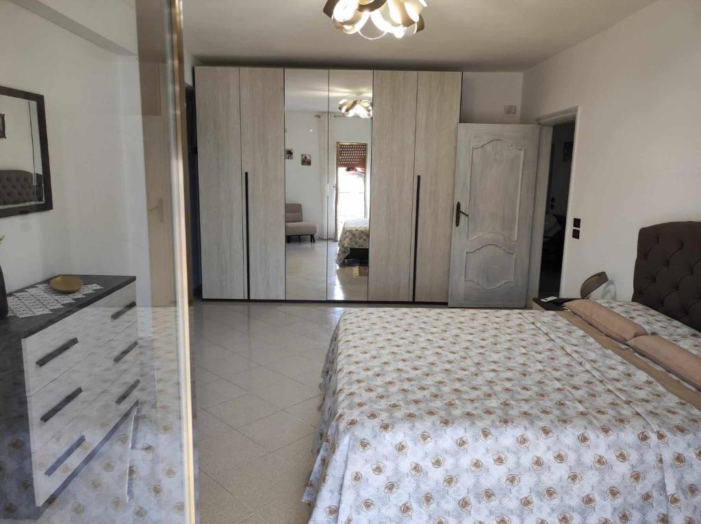 Postel nebo postele na pokoji v ubytování Casa Vacanza 6 posti letto - Grazia Home