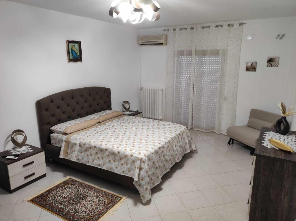 Postel nebo postele na pokoji v ubytování Casa Vacanza 6 posti letto - Grazia Home