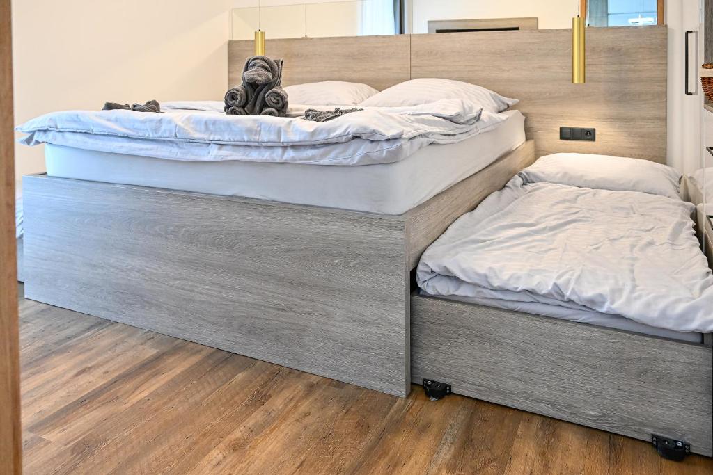 Postel nebo postele na pokoji v ubytování Unique View Design Apartment Štrbské Pleso