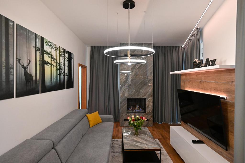 Posezení v ubytování Hotel Ovruč - rodinný apartmán 111