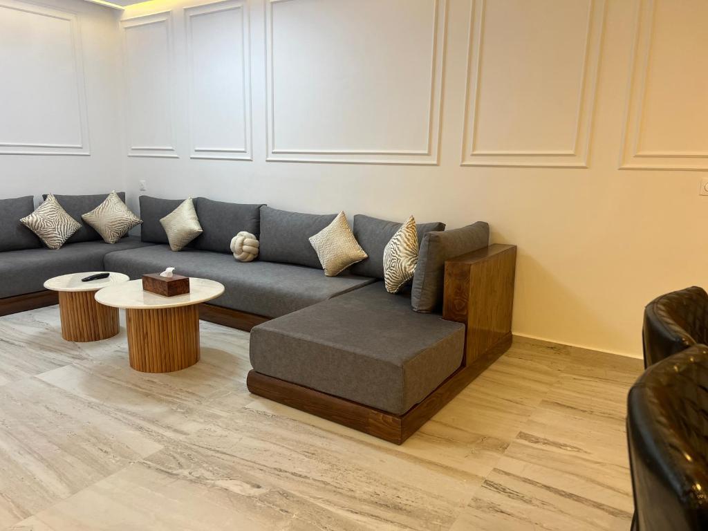 Posezení v ubytování Imi Ouaddar Appartement Parfait