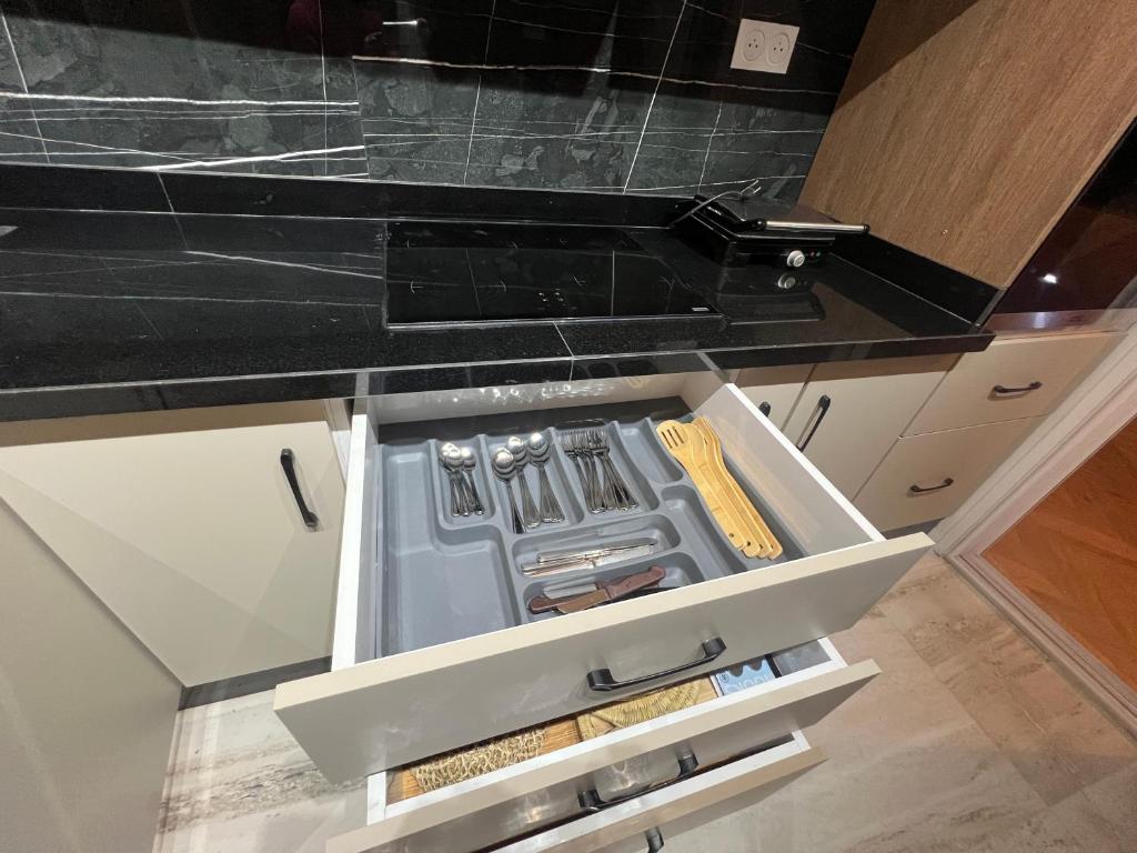 Kuchyň nebo kuchyňský kout v ubytování Imi Ouaddar Appartement Parfait