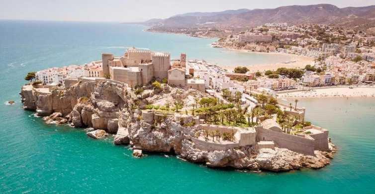 an aerial view of a city on a rocky island in the water at La perle de Benicarló 1 in Benicarló