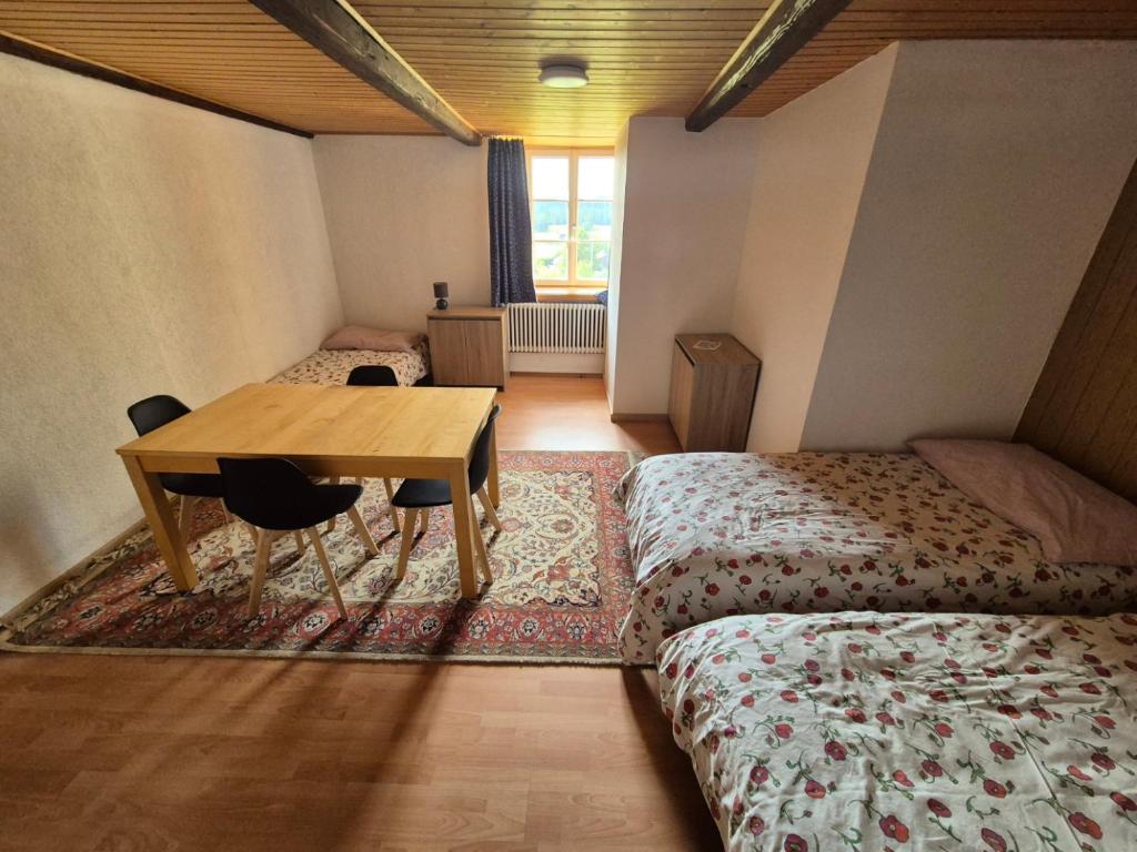 En eller flere senger på et rom på Chambre d'Hôtes R&S