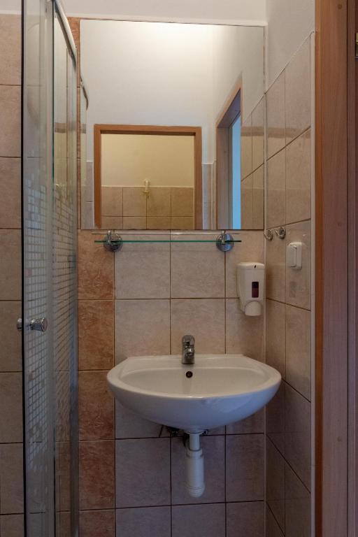 Koupelna v ubytování Apartmány U Pivoněk