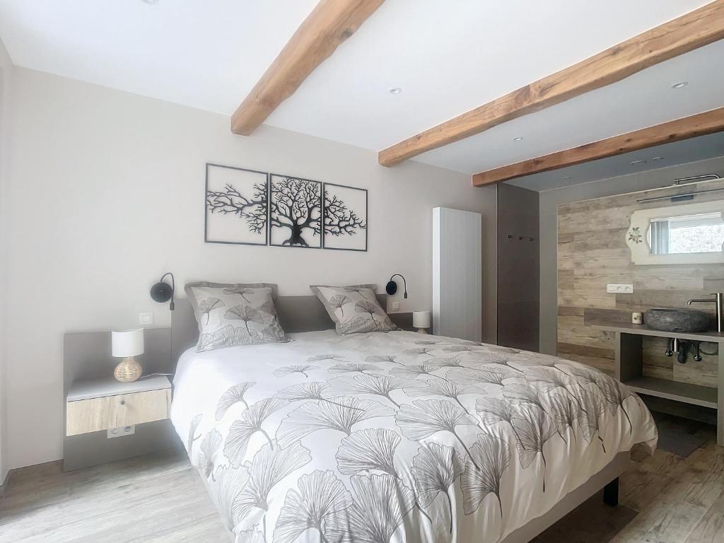 Postel nebo postele na pokoji v ubytování Gîte Les Longs Prés