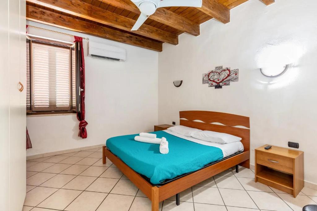 Łóżko lub łóżka w pokoju w obiekcie House Verona Zen