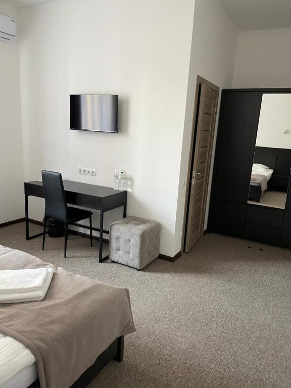 Postel nebo postele na pokoji v ubytování Leo Rooms