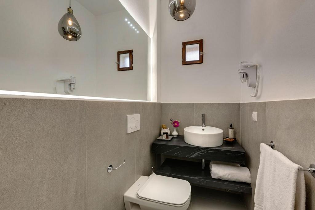 Łazienka w obiekcie AMORE RENTALS - Villa Mia