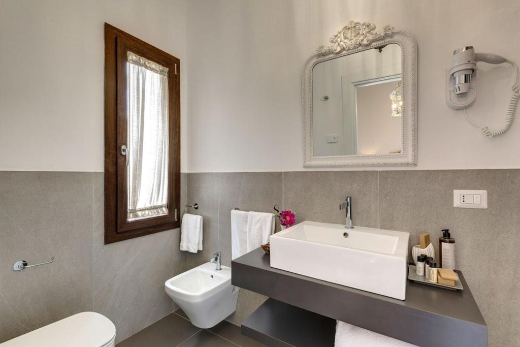 Łazienka w obiekcie AMORE RENTALS - Villa Mia