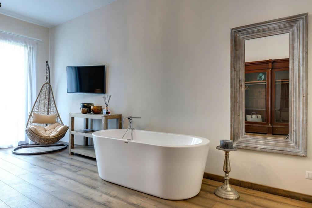 Telewizja i/lub zestaw kina domowego w obiekcie AMORE RENTALS - Villa Mia