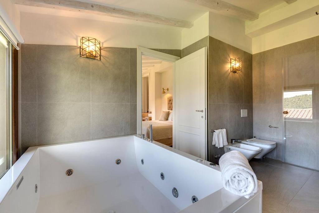 Łazienka w obiekcie AMORE RENTALS - Villa Mia