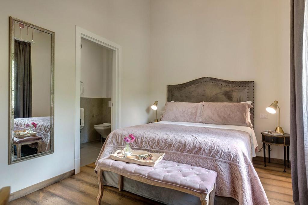 Łóżko lub łóżka w pokoju w obiekcie AMORE RENTALS - Villa Mia