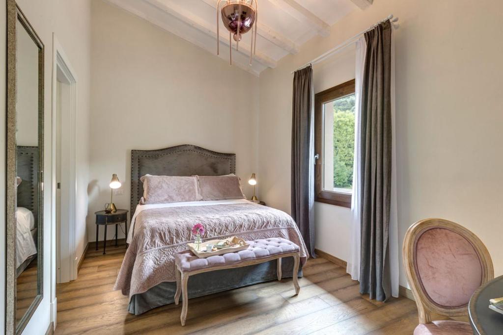 Łóżko lub łóżka w pokoju w obiekcie AMORE RENTALS - Villa Mia