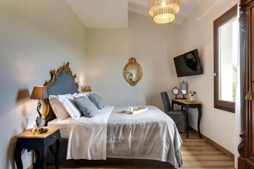 Łóżko lub łóżka w pokoju w obiekcie AMORE RENTALS - Villa Mia