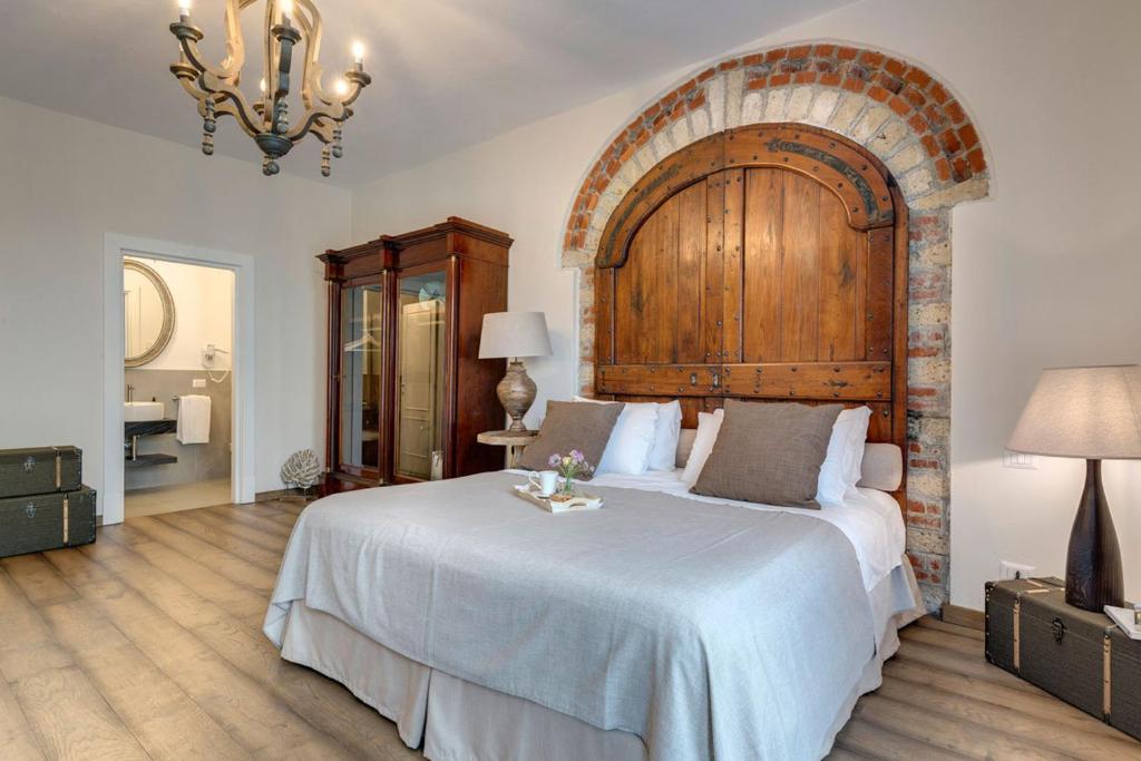 Łóżko lub łóżka w pokoju w obiekcie AMORE RENTALS - Villa Mia