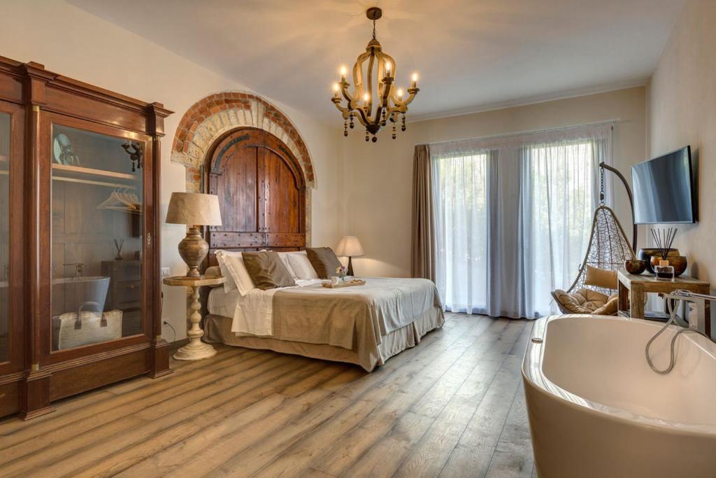 Łóżko lub łóżka w pokoju w obiekcie AMORE RENTALS - Villa Mia