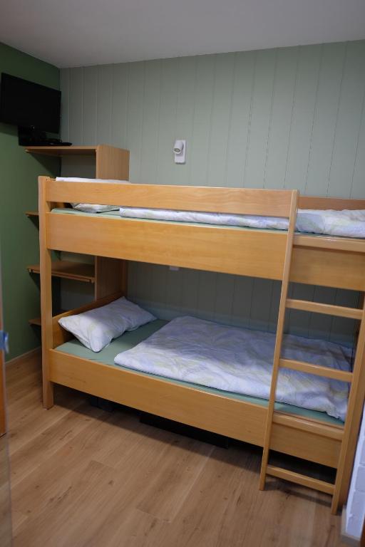 Postel nebo postele na pokoji v ubytování fewo-sporer