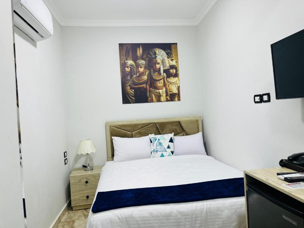 Postel nebo postele na pokoji v ubytování wadi El Muloak house