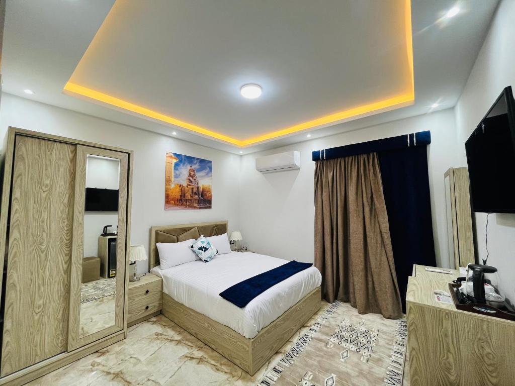 Postel nebo postele na pokoji v ubytování wadi El Muloak house
