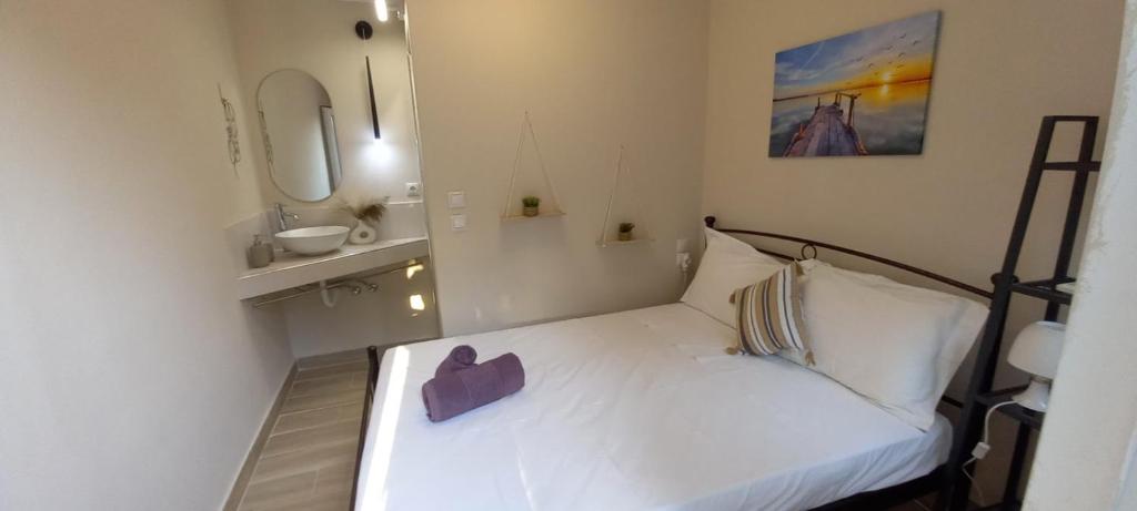 Postel nebo postele na pokoji v ubytování Villa Beloussi Zakynthos