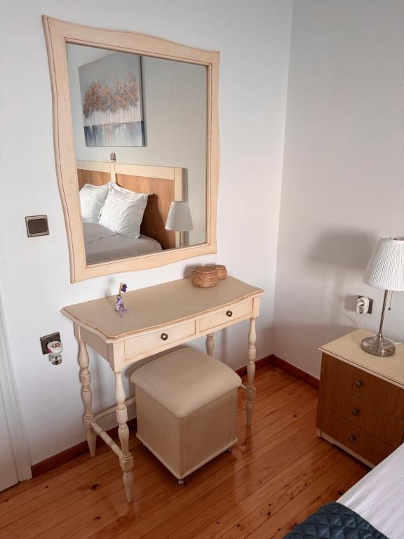 Postel nebo postele na pokoji v ubytování Anemos Apartment
