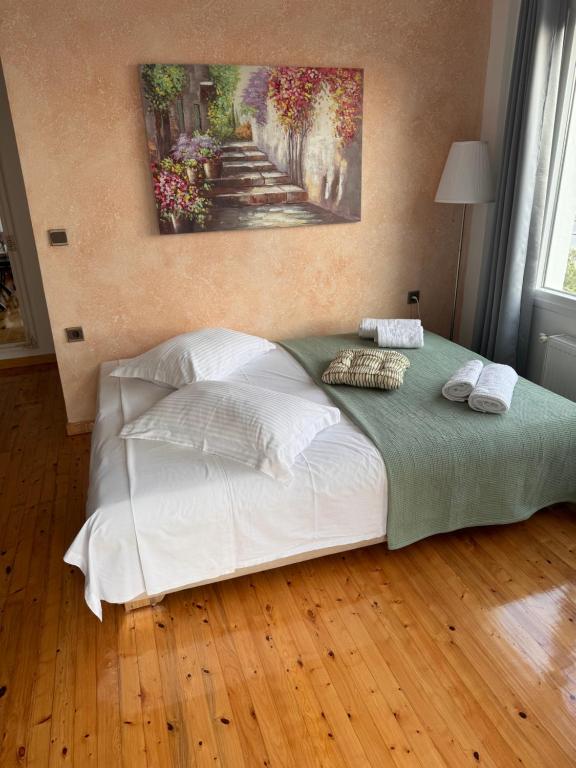 Postel nebo postele na pokoji v ubytování Anemos Apartment